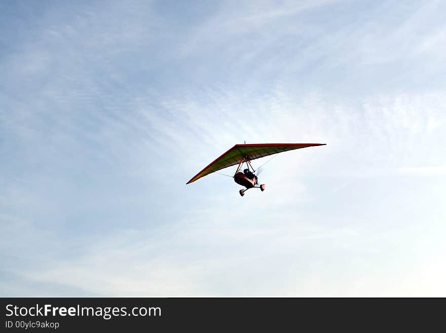 Ultra-light aeroplane on blue sky. Ultra-light aeroplane on blue sky