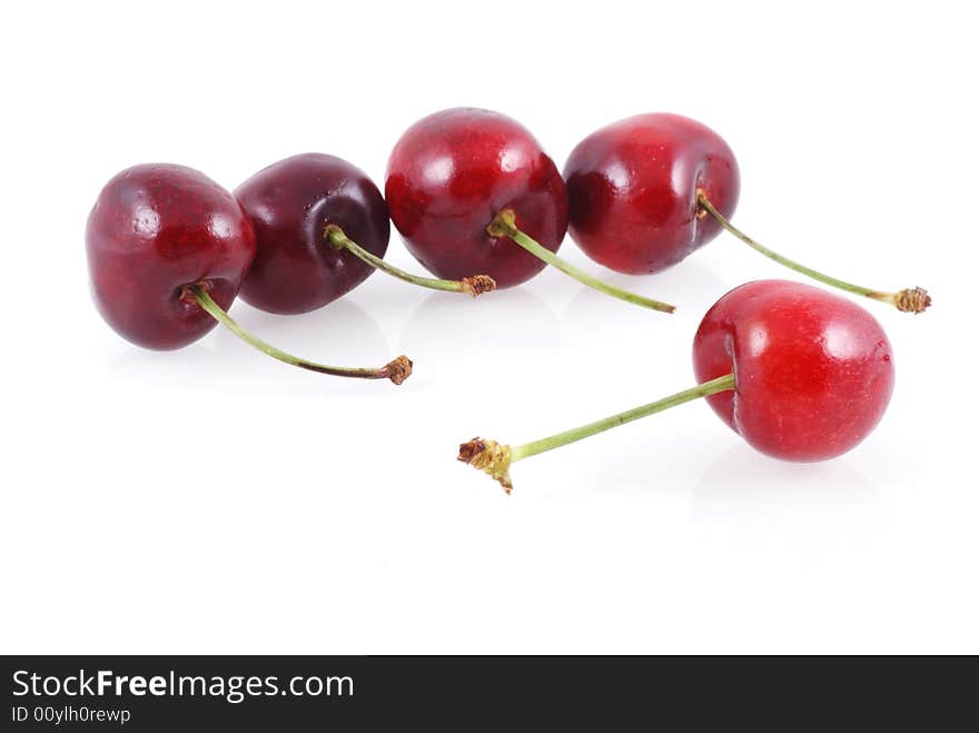 Five cherries isolated on a white background. Five cherries isolated on a white background.