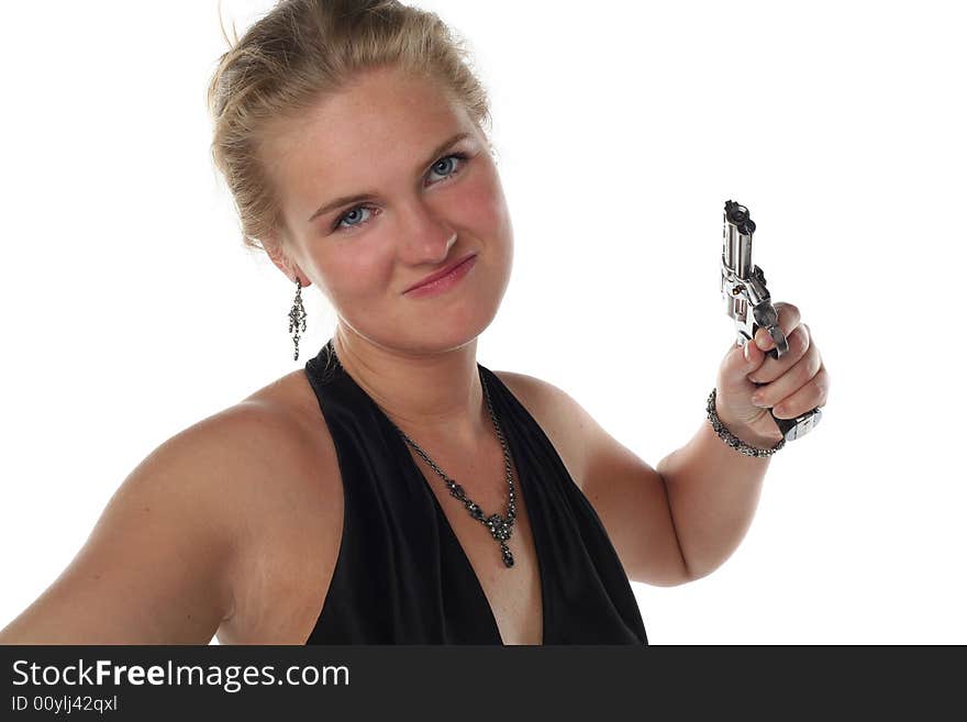 Young blond woman in black dress with revolver isolated on white background. Young blond woman in black dress with revolver isolated on white background