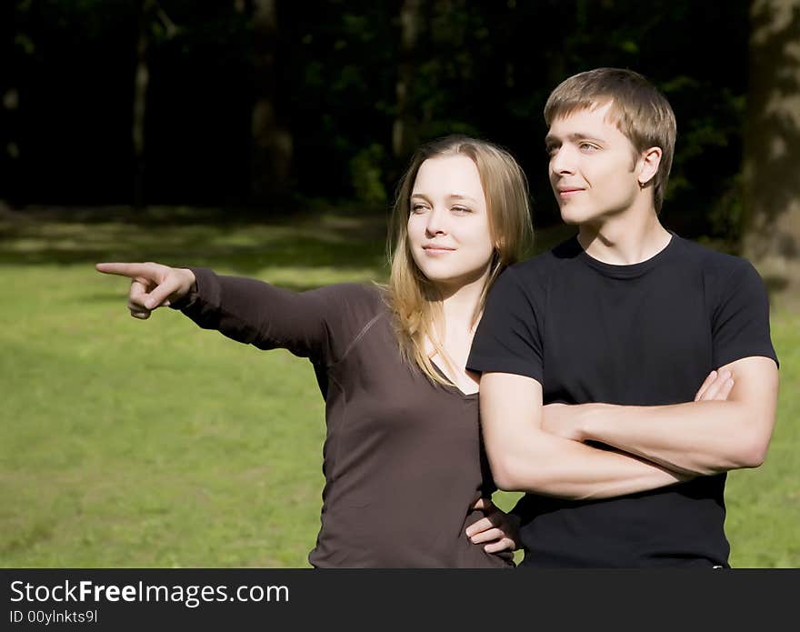 Young Family In The Park. Young Family In The Park