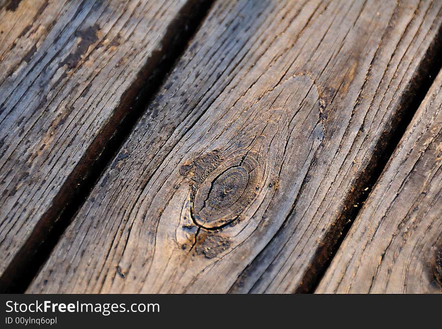 Part of an old ruined wooden bench