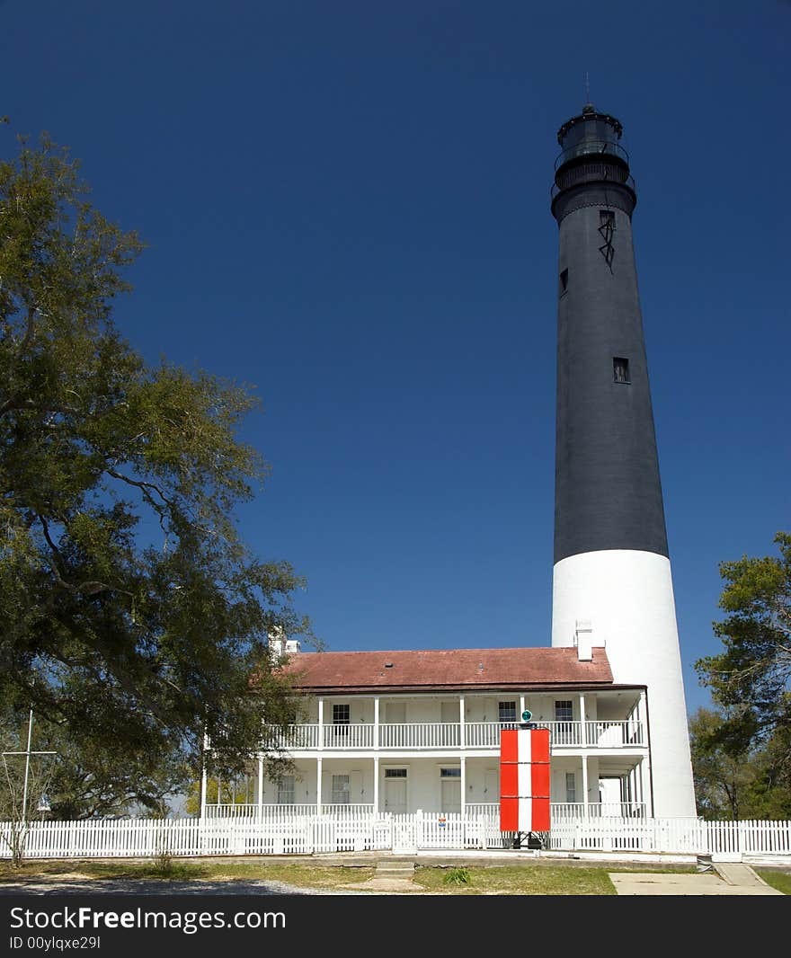 A lighthouse keep vigil over the Florida coastline. A lighthouse keep vigil over the Florida coastline