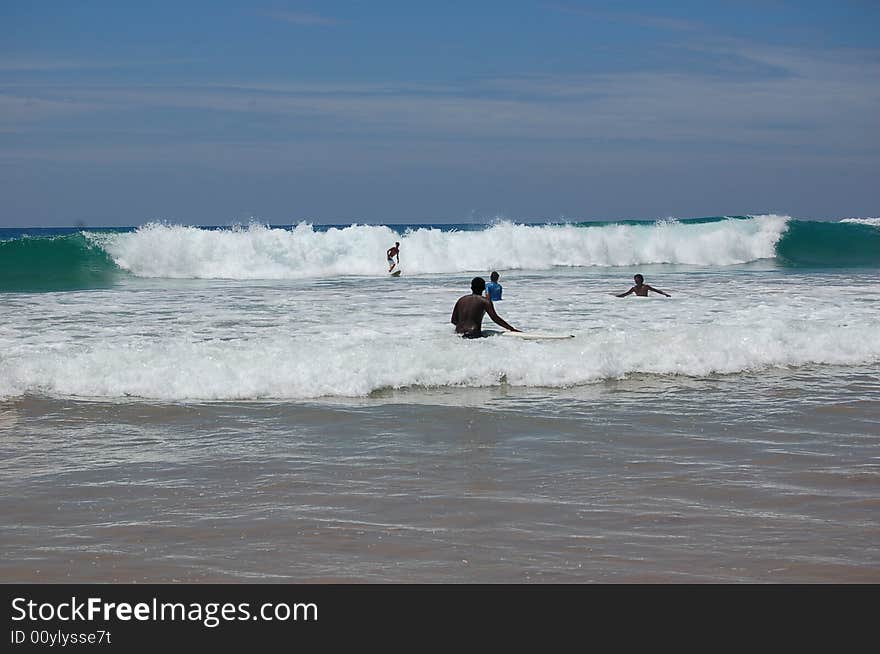 Man with wave board, in Sri lanka