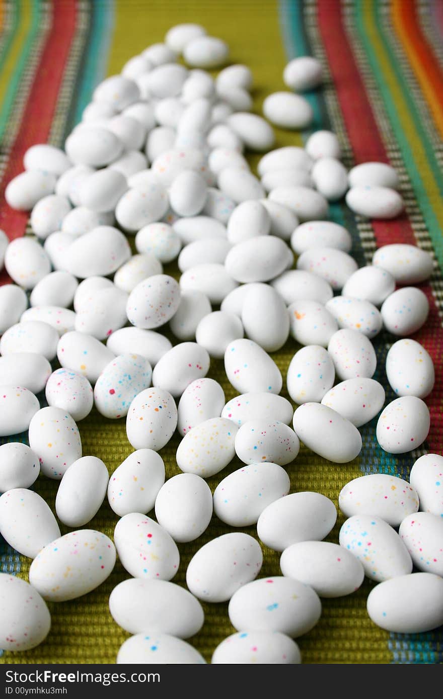 Miniature speckled easter eggs in a green bowl. Miniature speckled easter eggs in a green bowl