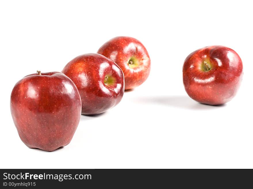 Fresh red apples isolated on a white background