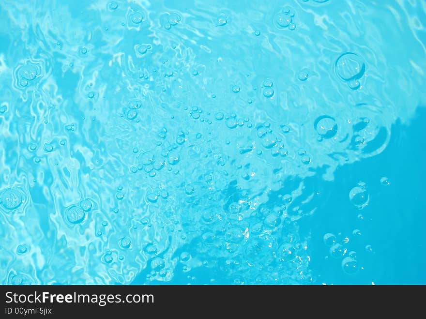 Flowing bubbles in pool water. Flowing bubbles in pool water