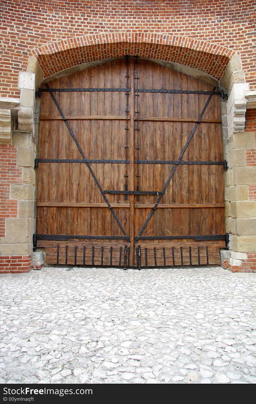 Old oak door with carved stone surround