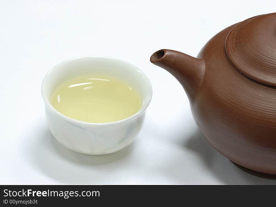 Isolated teapot and cup