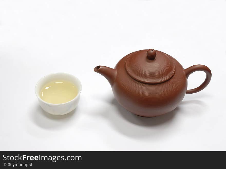 Isolated teapot and cup