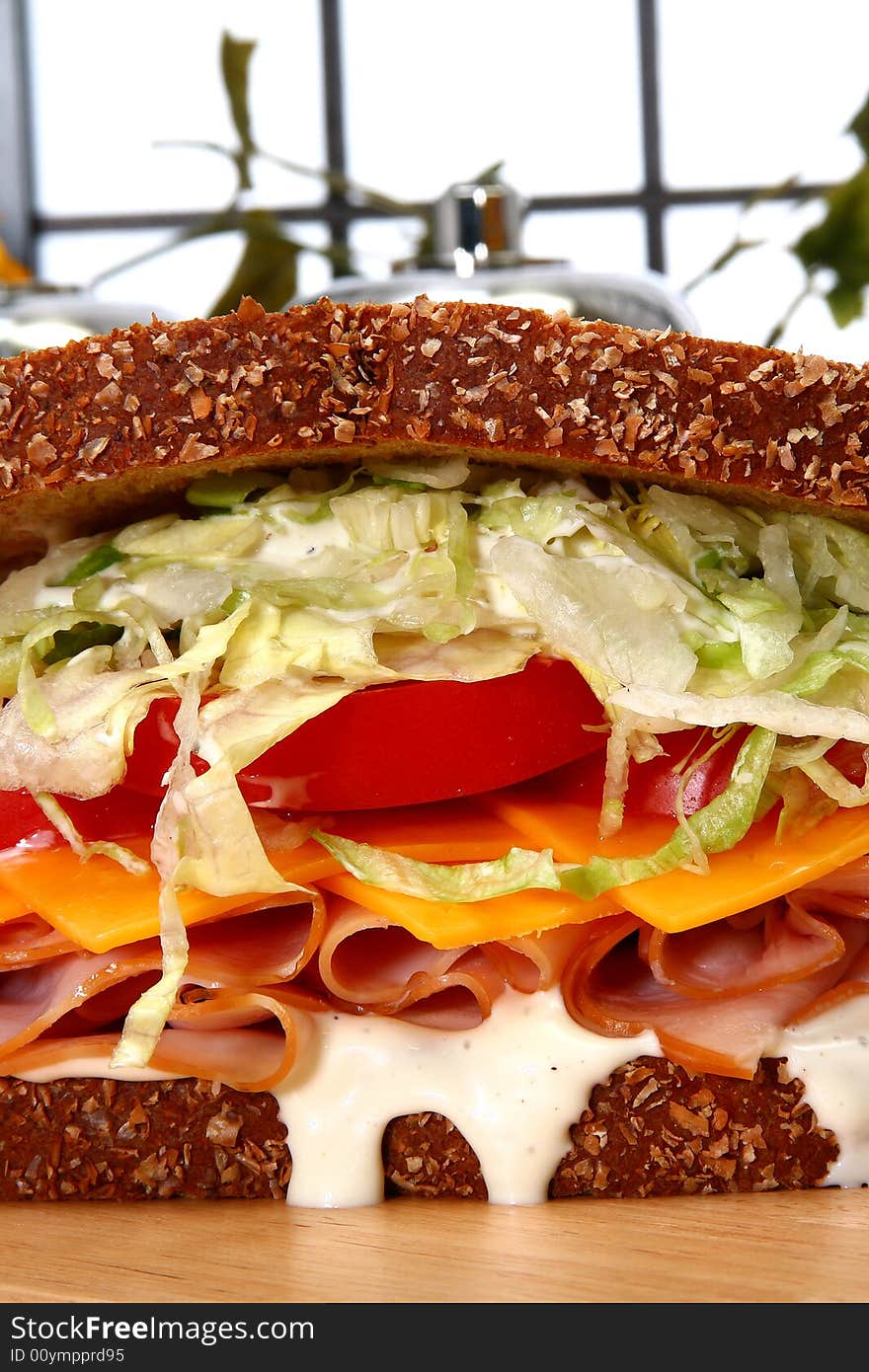 Fresh turkey sandwich with honey rosted deli turkey, shredded lettuce, cheddar cheese, tomatoes and ranch dressing on whole wheat.