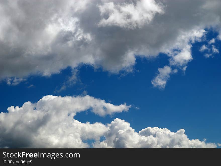 Cumulus clouds on a blue sky. Cumulus clouds on a blue sky