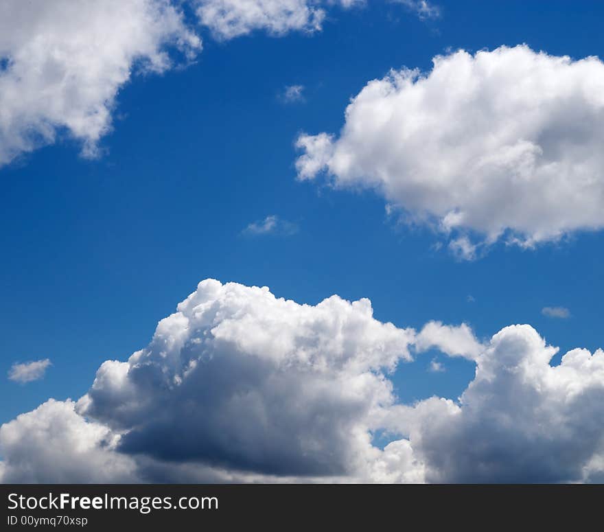 Cumulus clouds on a blue sky. Cumulus clouds on a blue sky