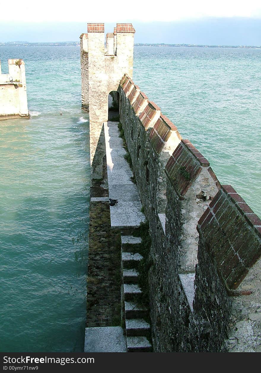 Medieval on a bank of lake, italy. Medieval on a bank of lake, italy