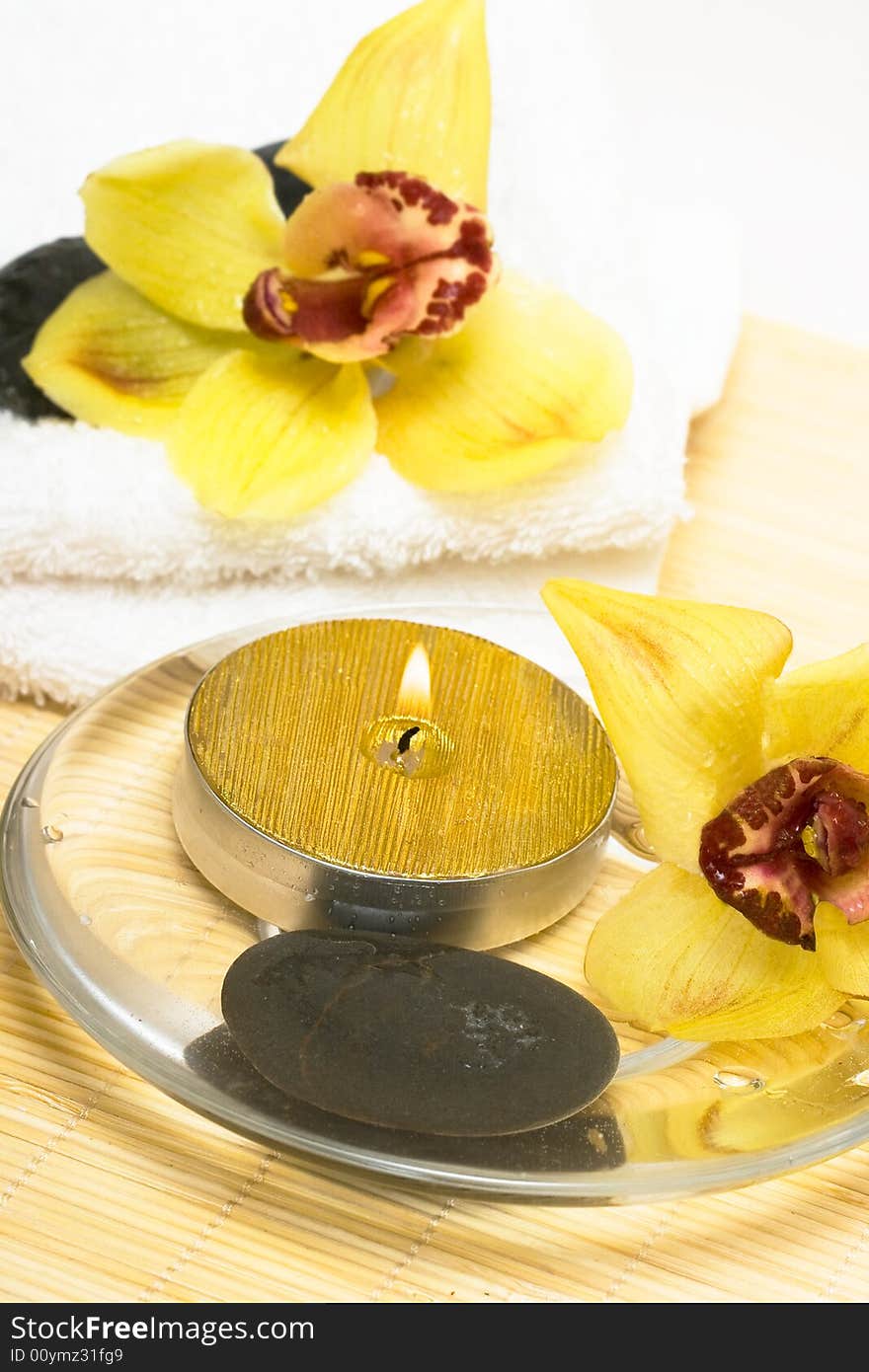 Candle With Yellow Orchids