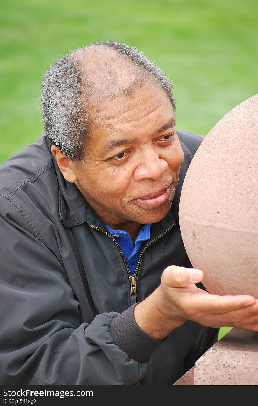 African american male holding the weight of the world.