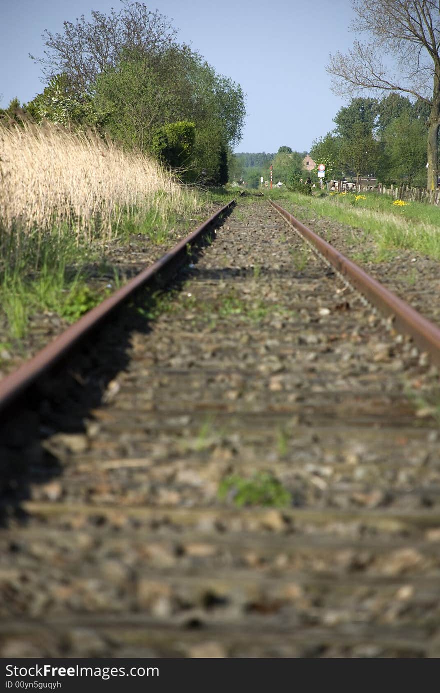 Old railway tracks with wooden crosses that are no longer in use. Old railway tracks with wooden crosses that are no longer in use.