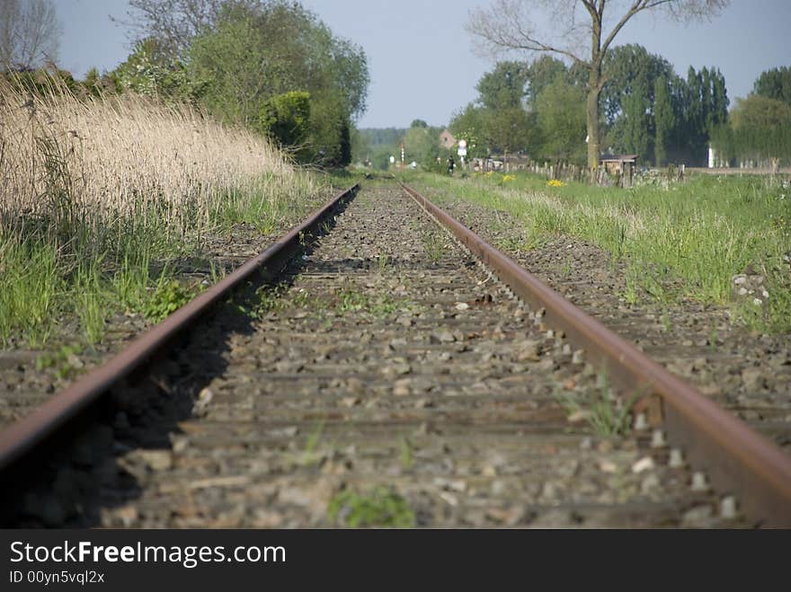 Old railway tracks with wooden crosses that are no longer in use. Old railway tracks with wooden crosses that are no longer in use.