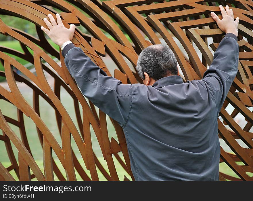 African american male holding the weight of the world.