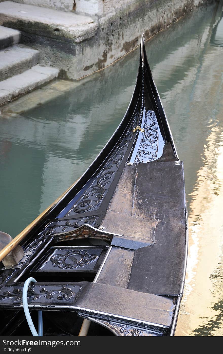 Front part of a gondola in Venice, Italy