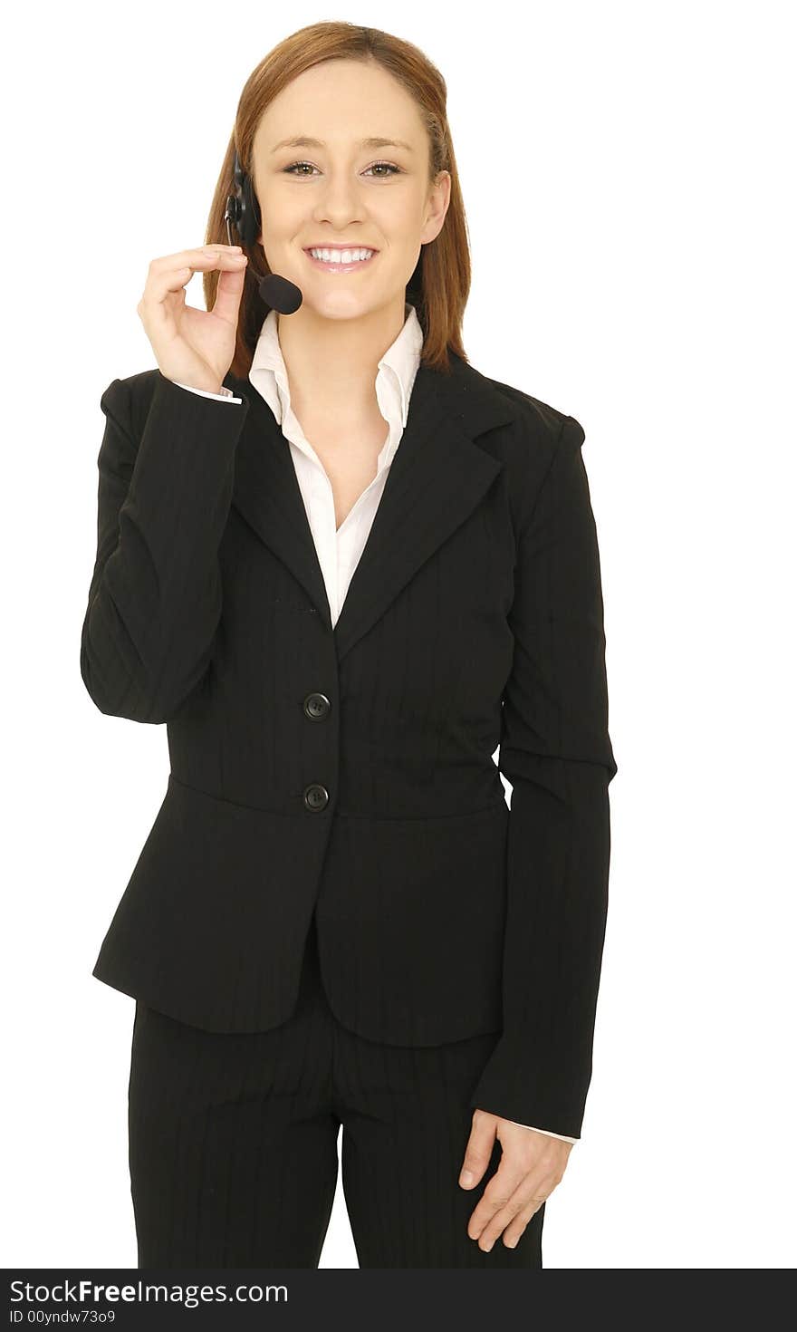 Shot from front of business woman holding her headset. Shot from front of business woman holding her headset