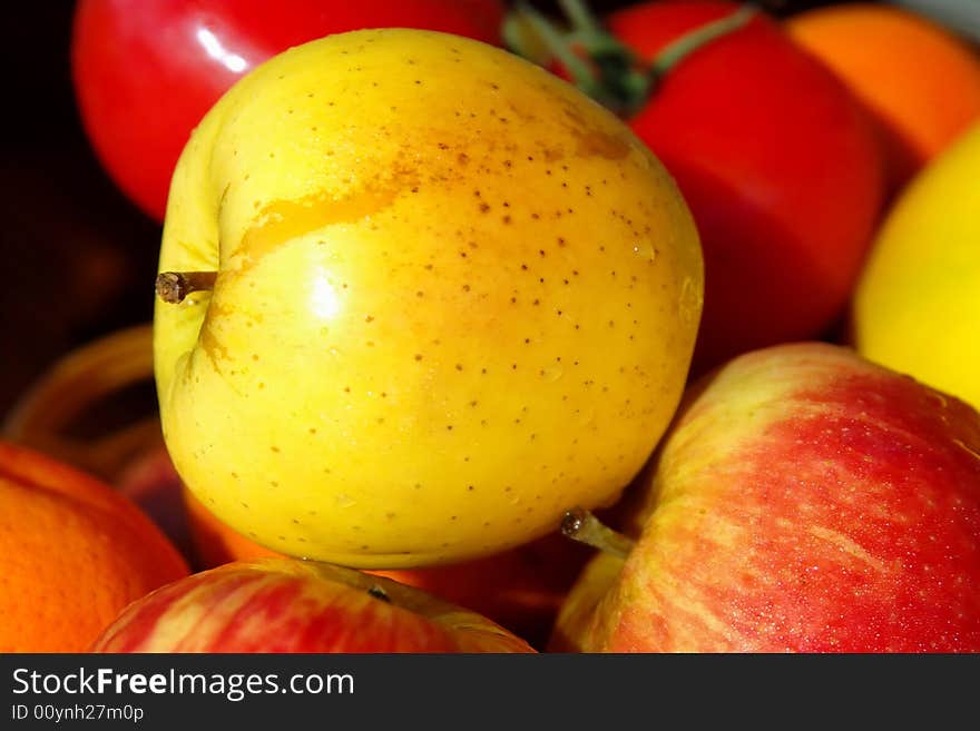 Colorful fruits in basket.