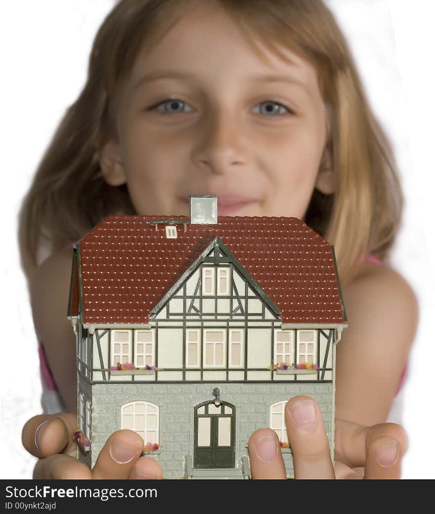 Young beautiful girl with house in hand. Young beautiful girl with house in hand