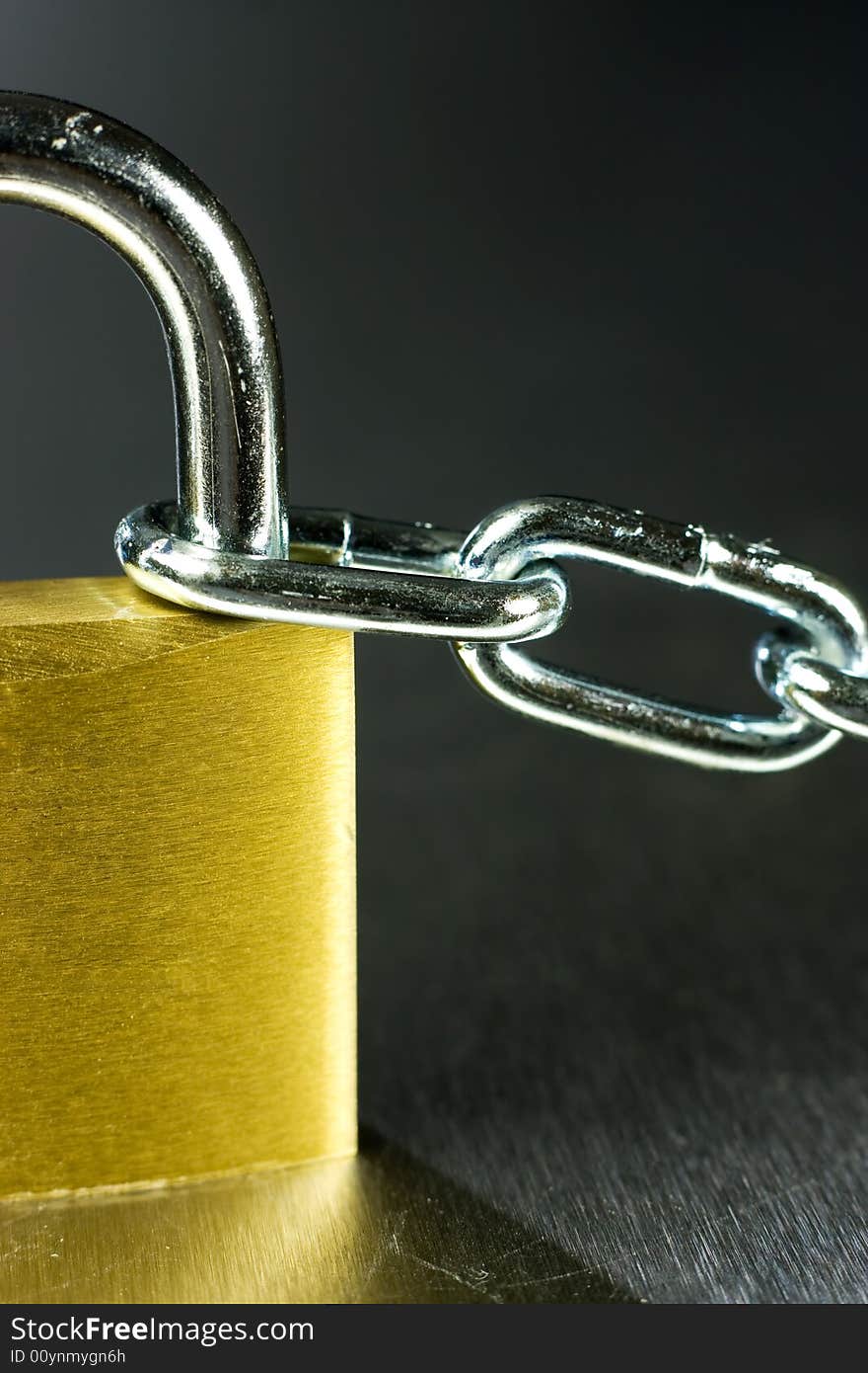 Strong Security Lock & Chain on a metal background. Strong Security Lock & Chain on a metal background