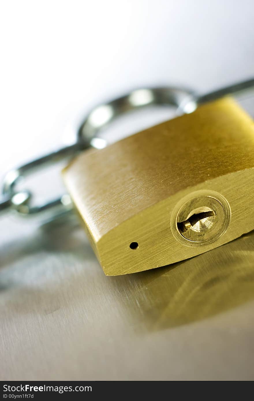 Strong Security Lock & Chain on a metal background. Strong Security Lock & Chain on a metal background