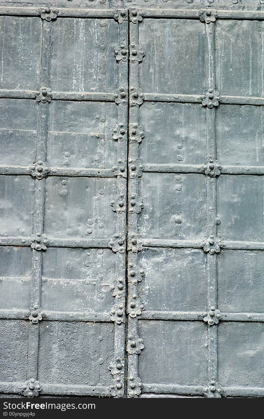 Texture of old gray metal gates. Texture of old gray metal gates