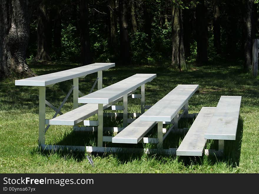 Metal bleachers at the baseball diamond in the park. Metal bleachers at the baseball diamond in the park