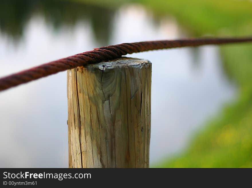 Small column whit lake in the background