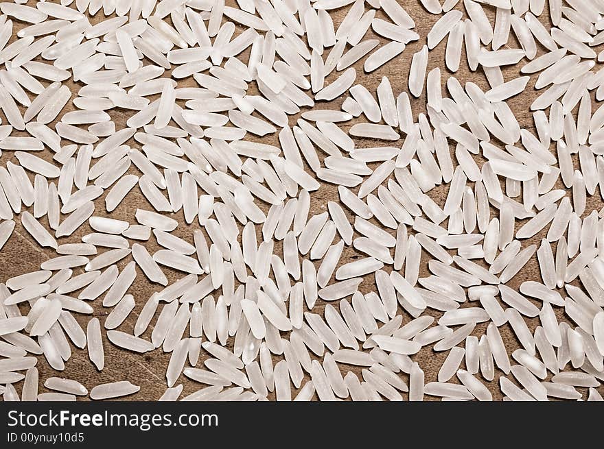 Rice on wooden table