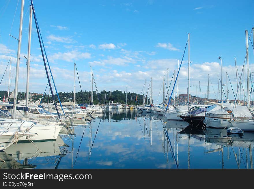 Ships at tranquill harbor - Rovinj in Croatia