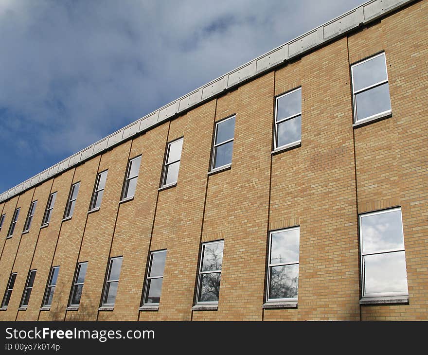 Brown brick building with sky