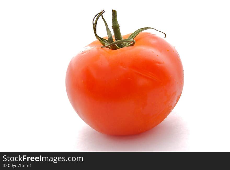 A photograph of a tomato against a white background