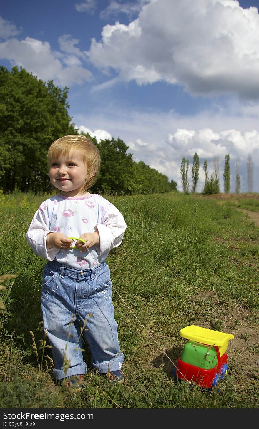 Girl and a bright toy