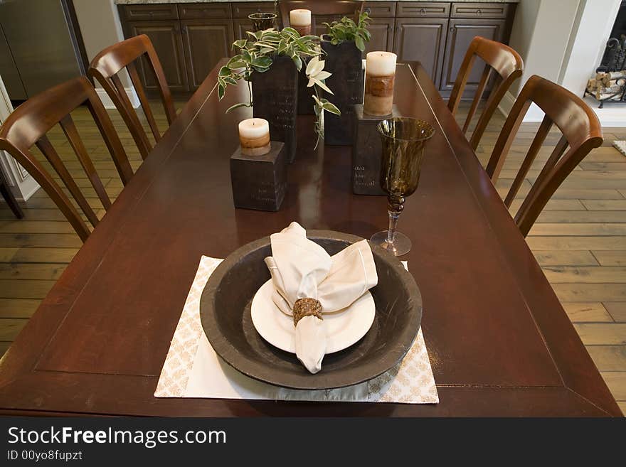 Dining table with modern tableware and decor. Dining table with modern tableware and decor.