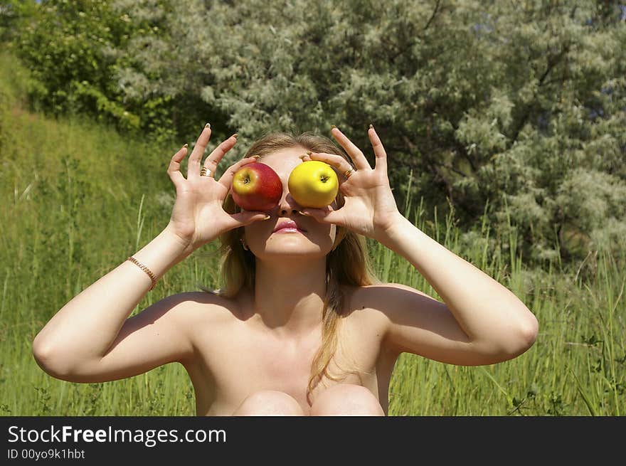 Cute woman holding an apples