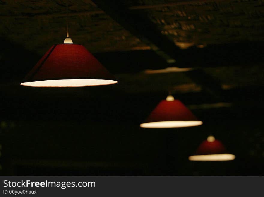 Open roof red lamps in a restaurant. Open roof red lamps in a restaurant