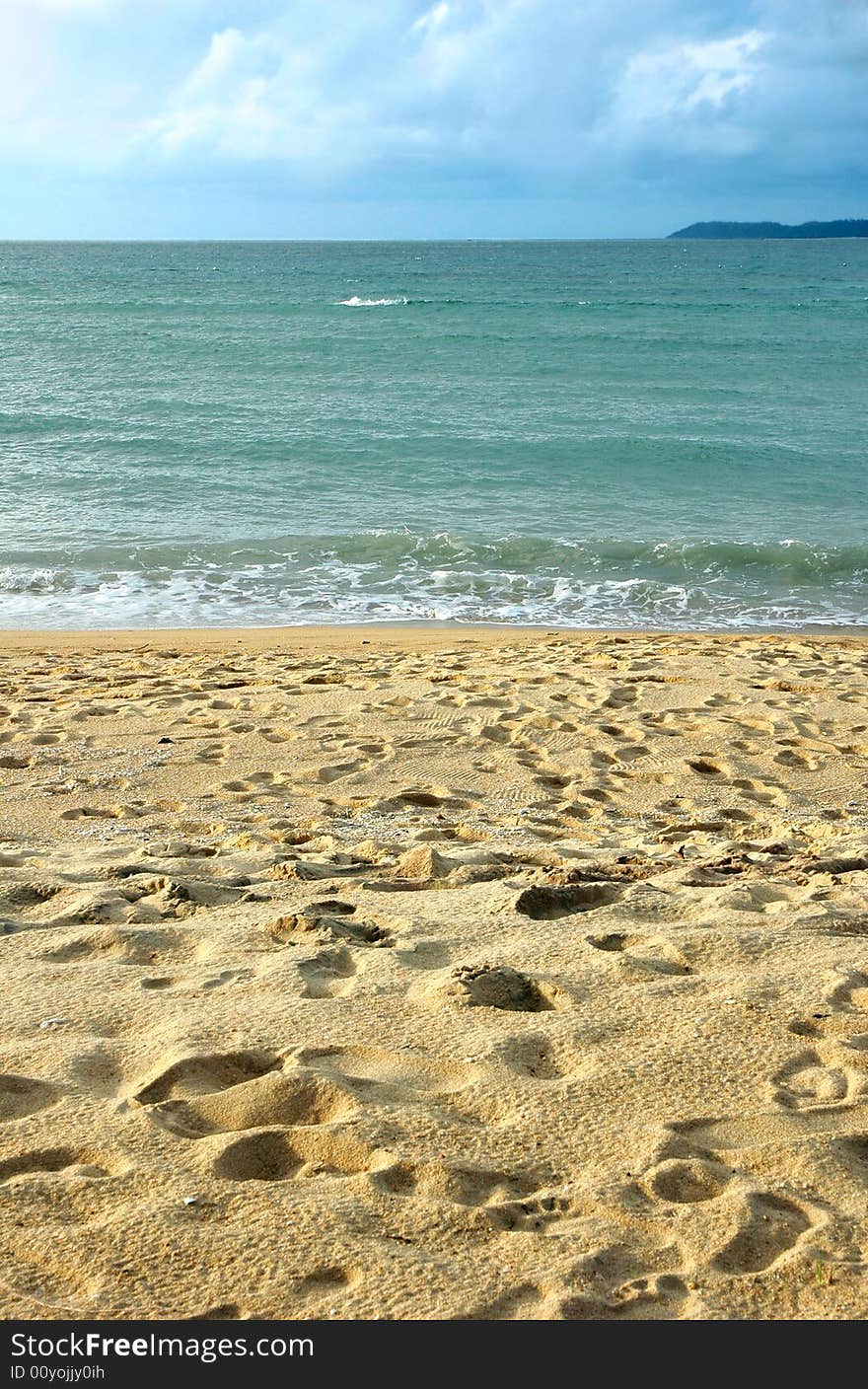 Peaceful sandy tropical beach on a summer day. Peaceful sandy tropical beach on a summer day