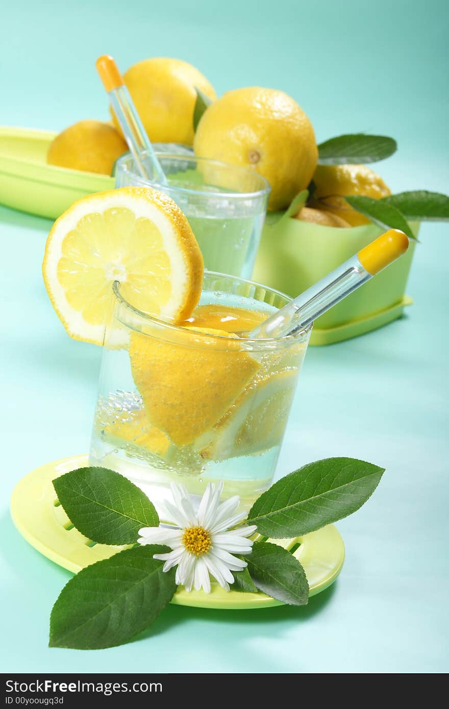 Closeup of glass of iced cold soda with lemon. Closeup of glass of iced cold soda with lemon