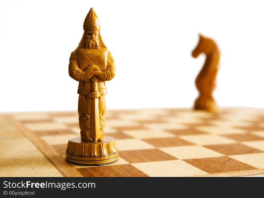 Knight and horse on chess board