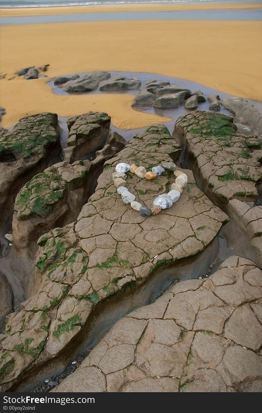 A love heart arranged with stones on the west coast of ireland near ballybunion. A love heart arranged with stones on the west coast of ireland near ballybunion