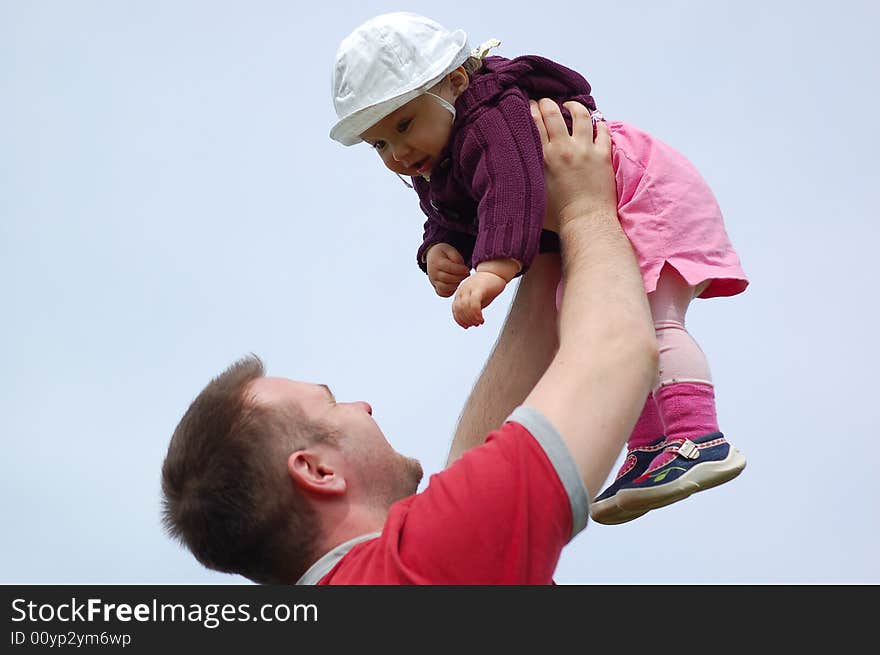 Happy family on sky background. Happy family on sky background