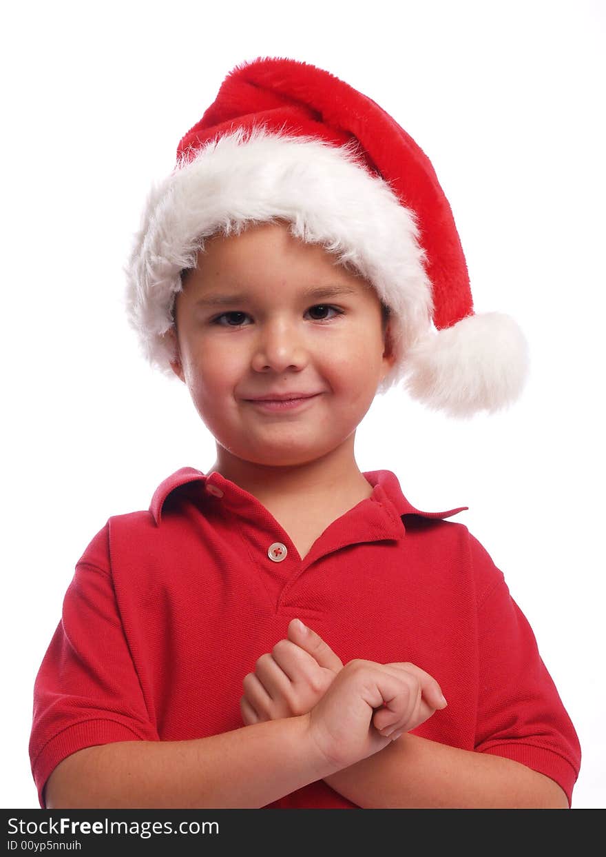 Cute ethnic boy with a santa hat. Cute ethnic boy with a santa hat