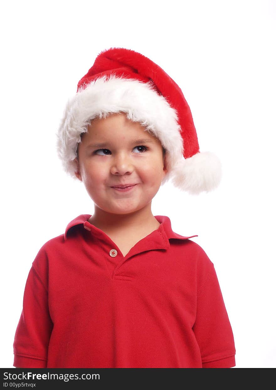 Cute ethnic boy with a santa hat. Cute ethnic boy with a santa hat