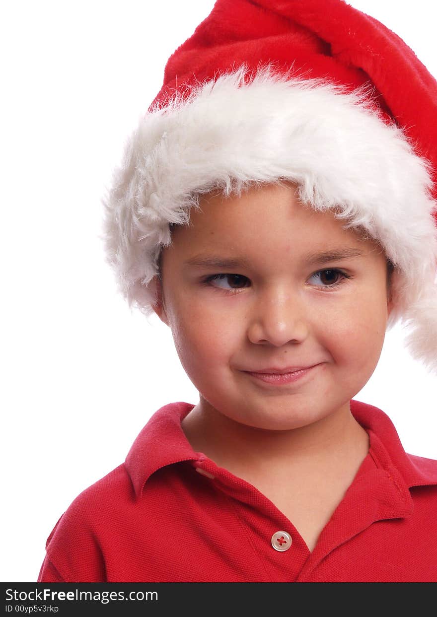 Cute ethnic boy with a santa hat. Cute ethnic boy with a santa hat