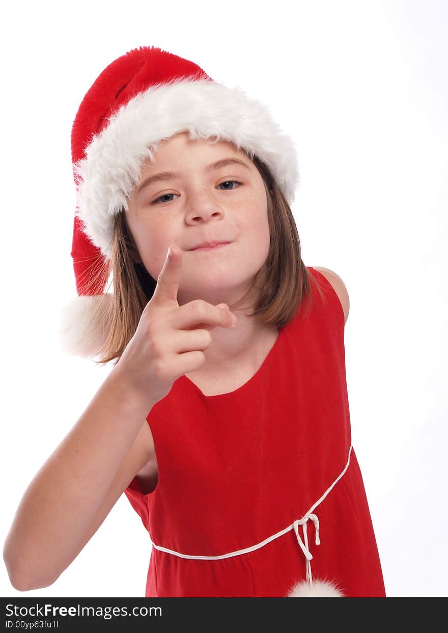 Cute young Santa girl is watching you!