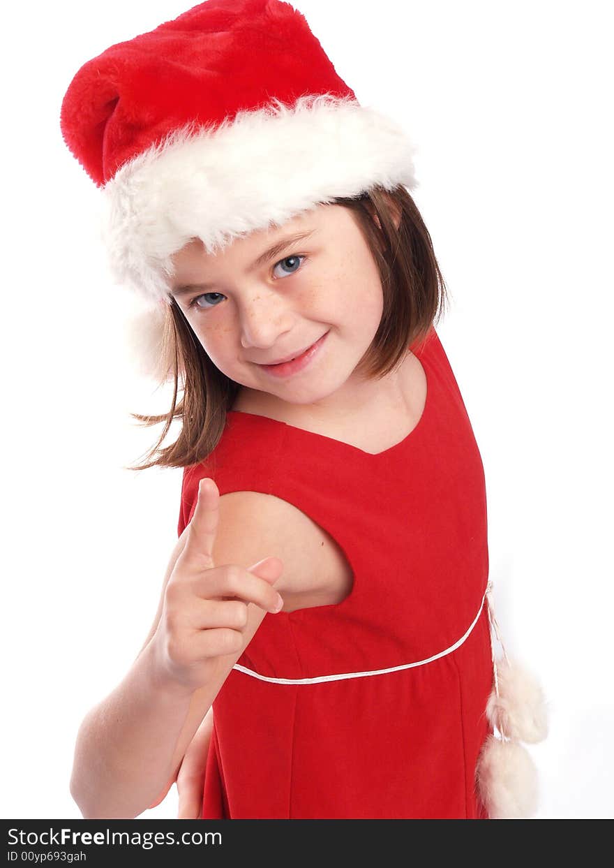 Cute young Santa girl is watching you!