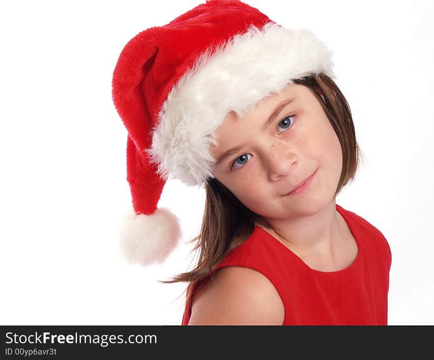 Beautiful little girl with a Santa hat on